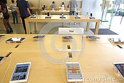 IPads displayed in an apple store Editorial Stock Photo