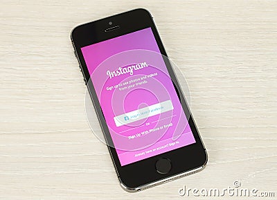 IPhone with Instagram login page on its screen Editorial Stock Photo