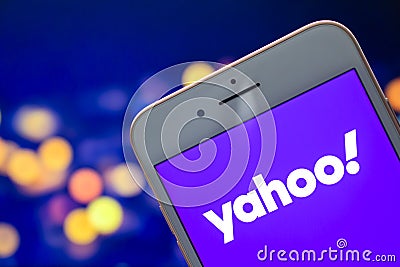 An iPhone Plus with a Yahoo logo on the screen Editorial Stock Photo