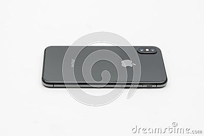 IPhone X or XS from behind, back, on white background Editorial Stock Photo