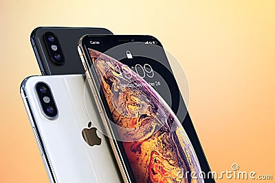 IPhone Xs Gold, Silver and Space Grey on light colors Editorial Stock Photo