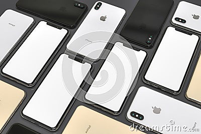 IPhone XS Gold, Silver and Space Grey smartphones, mosaic composition Editorial Stock Photo