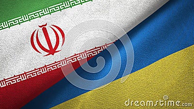 Iran and Ukraine two flags textile cloth, fabric texture Stock Photo