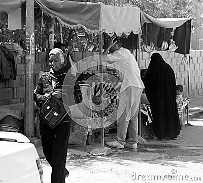 Different muslim people handles personal affairs after conflict with military during curfews Editorial Stock Photo