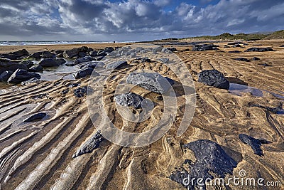 Ireland, Fanore beach with intensive orange sand Stock Photo