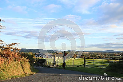 Exploring Ireland Countryside - greenary, blue sky, small houses - Irish countryside tours Stock Photo