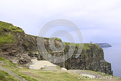 Irish coast ireland rock overhanging the sea Stock Photo