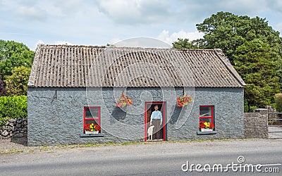 Irish Cottage With Painted Doors and Windows Editorial Stock Photo