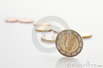 Irish and euro coins on white background Stock Photo