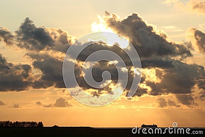 Irish Ferry silhouette sunset over Morecambe Bay Stock Photo