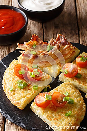 Irish food: potato pancakes Boxty with bacon, tomato and sauce c Stock Photo