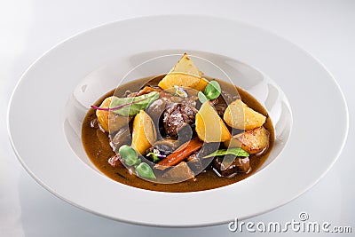 Irish Stew or Guinness Stew made in a crockpot or slow cooker. Stock Photo