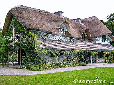 Irish traditional cottage house with roof thatch, Ireland Stock Photo