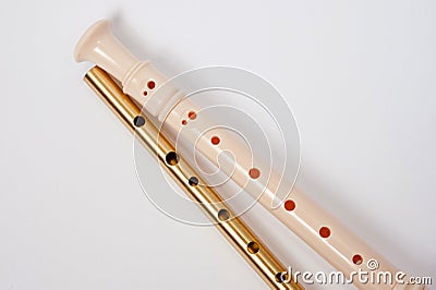 Irish whistle and block flute are longitudinal flutes with a whistle device and playing holes Stock Photo