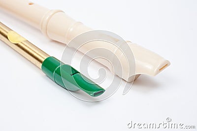 Irish whistle and block flute are longitudinal flutes with a whistle device and playing holes Stock Photo