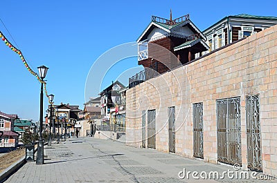 Irkutsk, Russia, March, 17, 2017. People walking in old styled 130-th quarter in Irkutsk Editorial Stock Photo