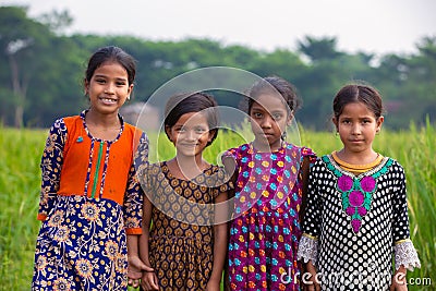 irls from the rural village are happy to be captured in a frame. Young girls standing with a big smile on their face Editorial Stock Photo