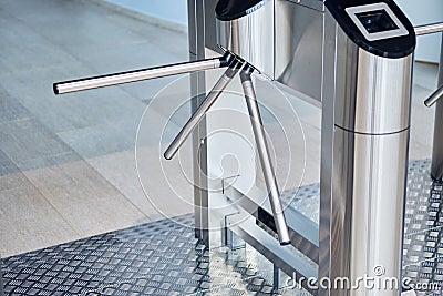 Iron bars of the turnstile for the passage of visitors Stock Photo