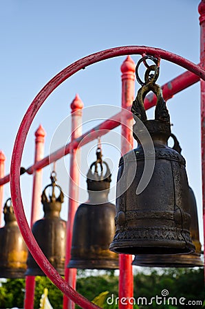 The iron bell on the Red pillar Stock Photo