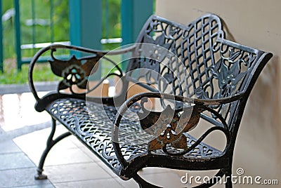 Iron bench at the garden Stock Photo