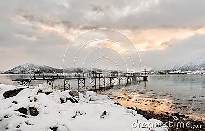 The iron bridge is protruding into the sea Stock Photo