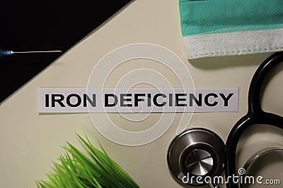 Iron Deficiency with inspiration and healthcare/medical concept on desk background Stock Photo