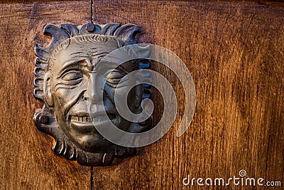 Iron head at the door of a colonial house Stock Photo
