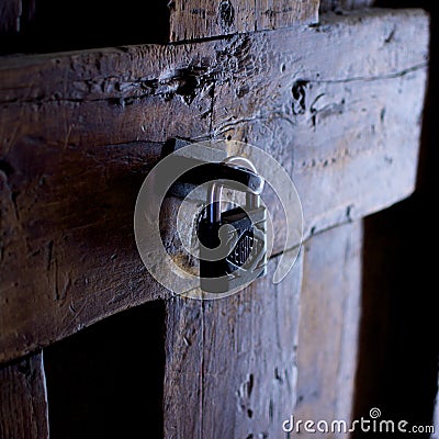 Iron Lock on a Wooden Door Editorial Stock Photo
