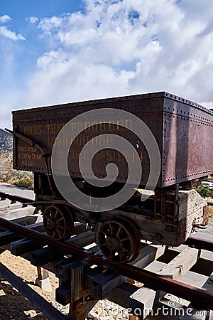 Iron ore cart with cloudy skys over head Editorial Stock Photo