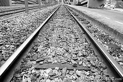 iron railway over dark stone Stock Photo