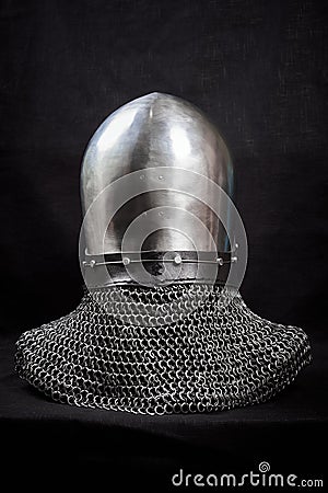 Knight helmet on a black background. Back view Stock Photo