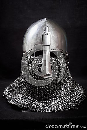 Knight helmet on a black background. Front view Stock Photo