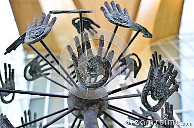 Iron sculpture of hands, palms Editorial Stock Photo