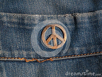 Iron sign of a pacifist on denim Stock Photo