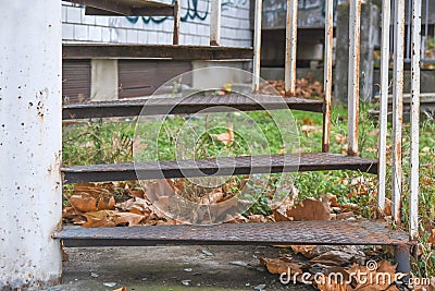 Iron stairs going up in old structure building autumn season Stock Photo