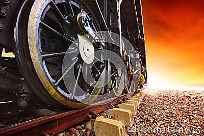 Iron wheels of stream engine locomotive train on railways track Stock Photo