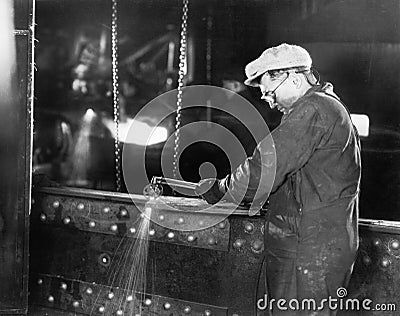 Iron worker welding Stock Photo