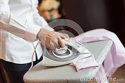 Ironing shirt Stock Photo