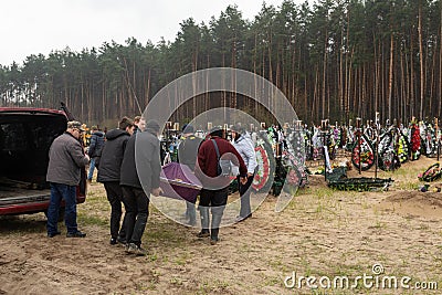 Irpin cemetery full of fresh graves of civilian people Editorial Stock Photo