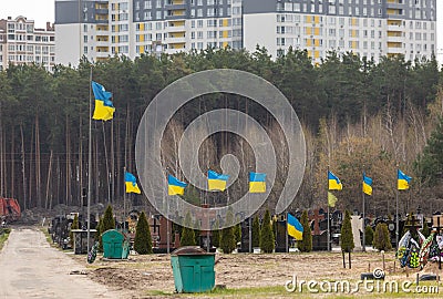 Irpin cemetery full of fresh graves of civilian people Editorial Stock Photo