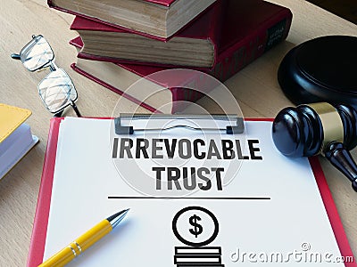 Irrevocable trust document is shown using the text Stock Photo