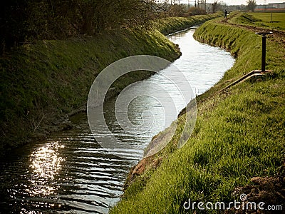 irrigation canal in open countryside Stock Photo