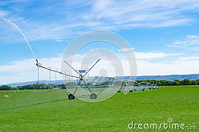 Irrigation system running on a farm in Central Otago Editorial Stock Photo