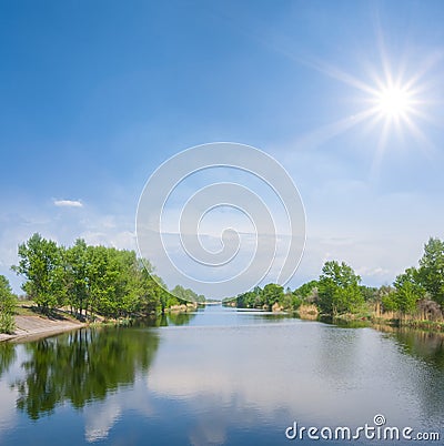 Irrigational channel at summer sunny day Stock Photo