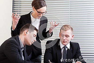 Irritated businesswoman at meeting Stock Photo