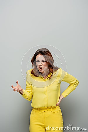 irritated woman with angry grimace showing Stock Photo