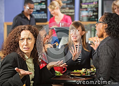 Irritated Woman in Cafe Stock Photo