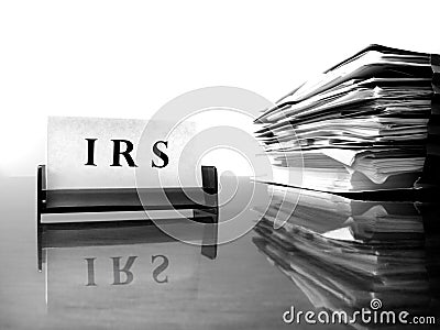 IRS Card with Tax Files Stock Photo
