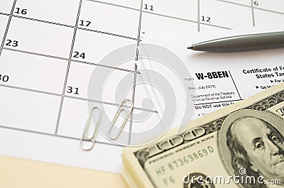 IRS Form W-8BEN Certificate of foreign status of beneficial owner for United States tax withholding and reporting for individuals Editorial Stock Photo