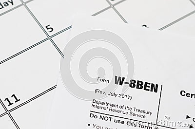 IRS Form W-8BEN Certificate of foreign status of beneficial owner for United States tax withholding and reporting for individuals Editorial Stock Photo